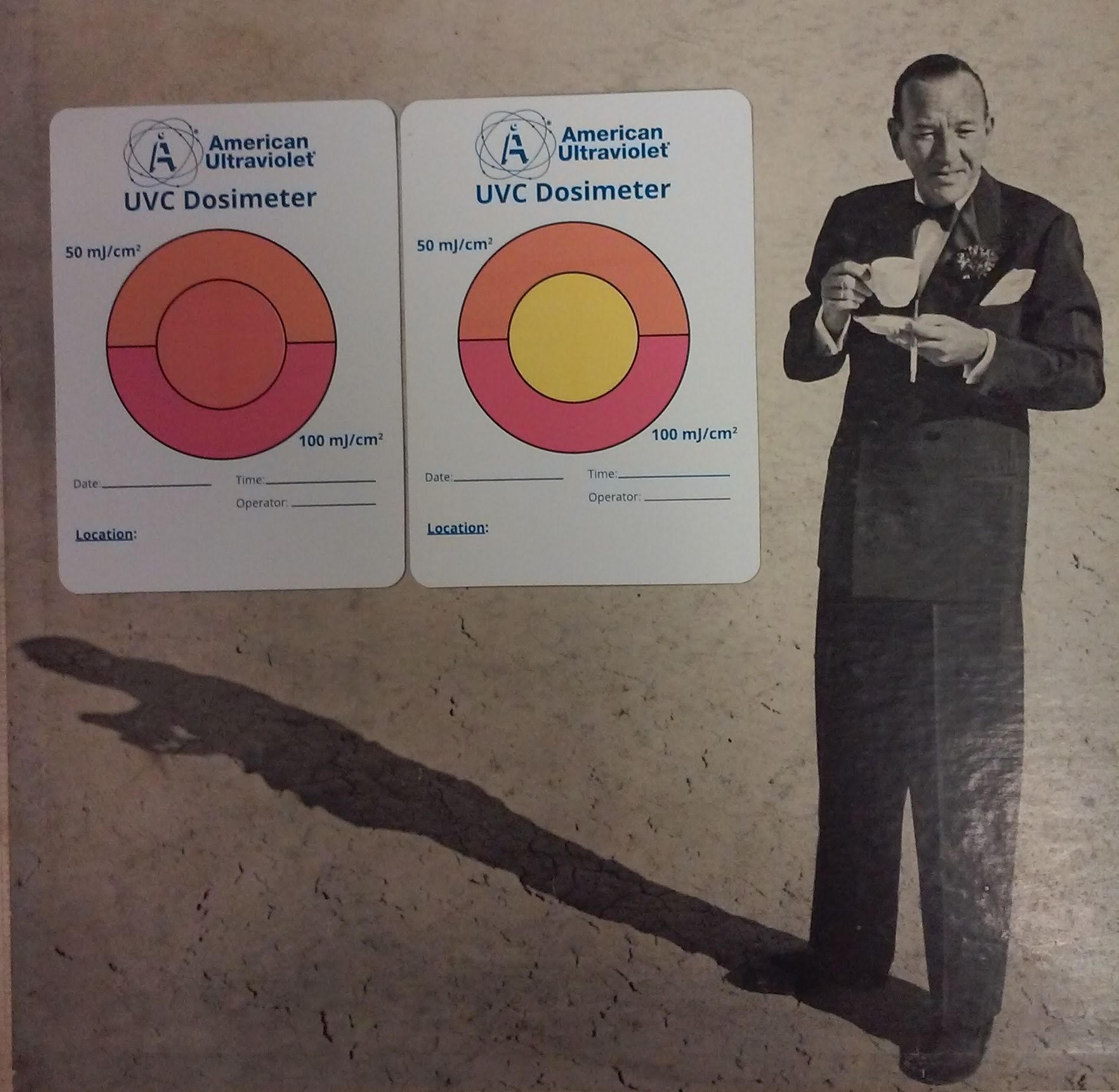 Before and after UVC dosimeter cards showing color change from cumulative UV exposure