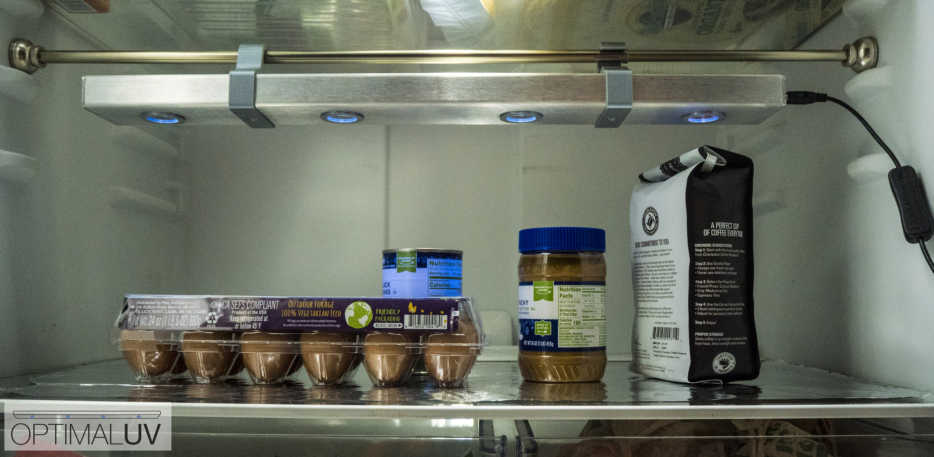 OptimalUV bar installed in a refrigerator, lights on